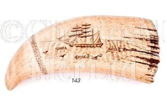 Lot 143 - Ø A 19TH-CENTURY SAILOR'S SCRIMSHAW-DECORATED WHALE'S TOOTH
