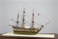Lot 289 - A MODEL OF H.M.S. VICTORY<br/>with carved hull,...
