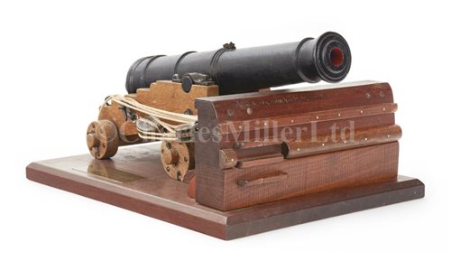 Lot 67 - A WELL-PRESENTED IRON AND WOOD MODEL OF A 32-POUNDER CANNON