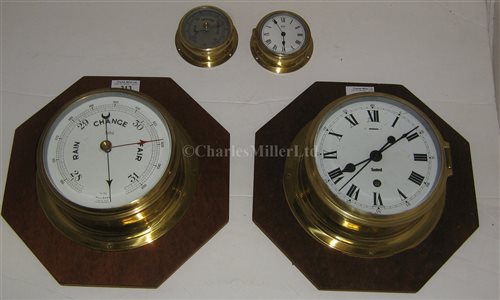 Lot 313 - A BULKHEAD CLOCK AND BAROMETER SET BY...