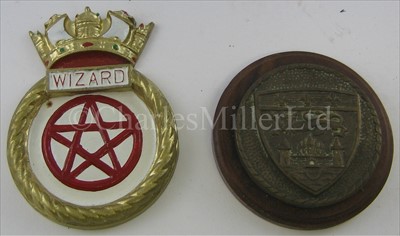 Lot 30 - AN UNOFFICIAL BRASS BADGE FOR H.M.S. SPORTIVE...
