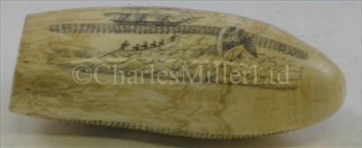 Lot 99 - A SCRIMSHAW-DECORATED WHALE TOOTH<br/>incised over...