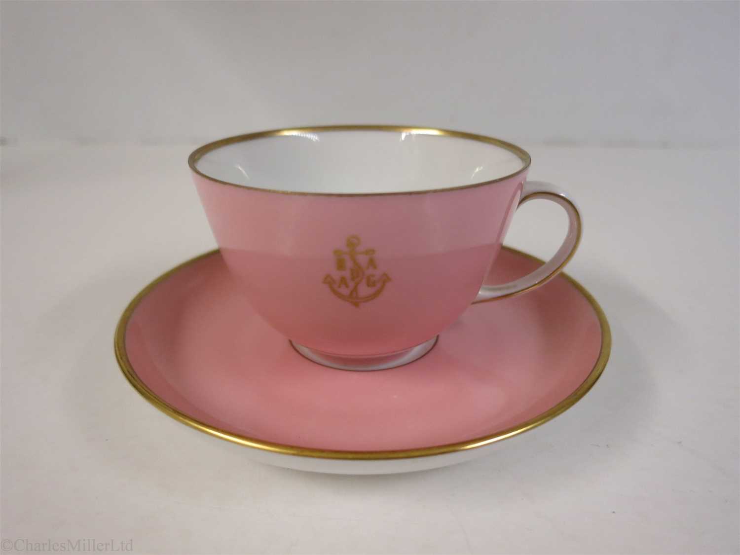Lot 55 - HAMBURG-AMERICAN (H.A.P.A.G.) LINE: A PINK PORCELAIN COFFEE CUP AND SAUCER BY FÜRSTENBERG, GERMANY, CIRCA 1950