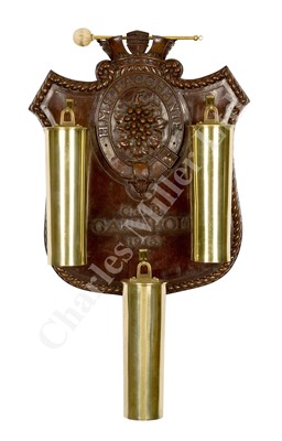 Lot 96 - A SOUVENIR DINNER GONG CARVED FROM WOOD AND BRASS SHELL CASES RECOVERED FROM H.M.S. BACCHANTE, GALLIPOLI, 1915