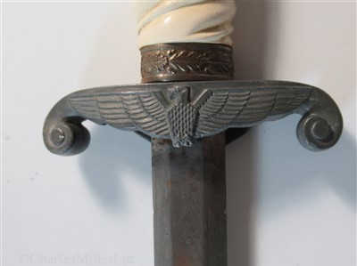 Lot 104 - A THIRD REICH KRIEGSMARINE DIRK; and another similar