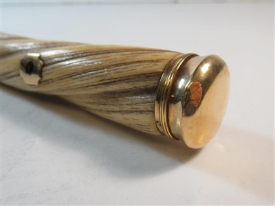 Lot 137 - Ø A 19TH CENTURY GOLD-MOUNTED NARWHAL TUSK WALKING STICK
