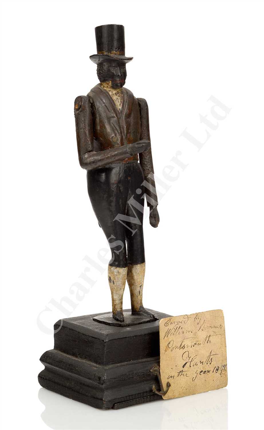 Lot 37 - AN UNUSUAL ARTICULATED FIGURINE CARVED FROM TIMBER RECOVERED FROM H.M.S. ROYAL GEORGE, CIRCA 1842