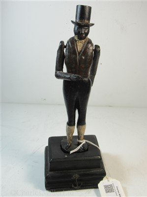 Lot 37 - AN UNUSUAL ARTICULATED FIGURINE CARVED FROM TIMBER RECOVERED FROM H.M.S. ROYAL GEORGE, CIRCA 1842