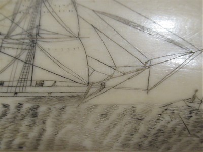 Lot 144 - Ø A MID-19TH CENTURY SAILOR DECORATED SCRIMSHAW WHALE'S TOOTH