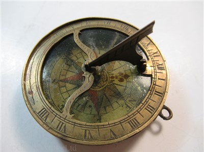 Lot 265 - AN 18TH CENTURY POCKET COMPASS SUNDIAL; and 2 other compasses