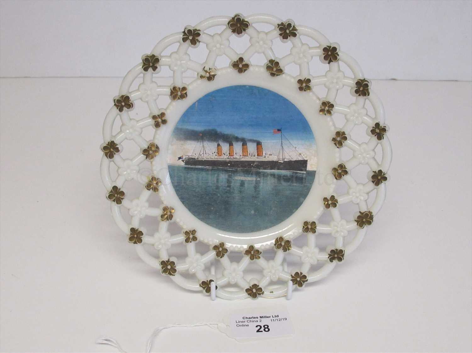 Lot 28 - Cunard: A souvenir glass ribbon plate from R.M.S. Mauretania