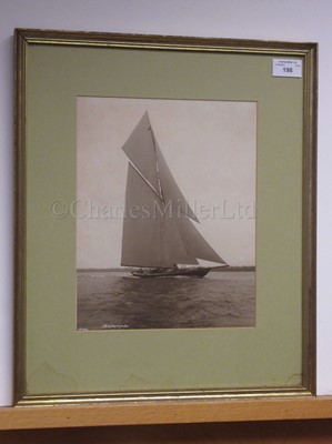 Lot 198 - A SEPIA PHOTOGRAPH OF H.M. RACING YACHT BRITANNIA BY BEKEN OF COWES