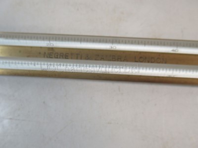 Lot 311 - AN ASSMANN TYPE WET/DRY BULB HYGROMETER, NEGRETTI & ZAMBRA, LONDON, CIRCA 1930; and another