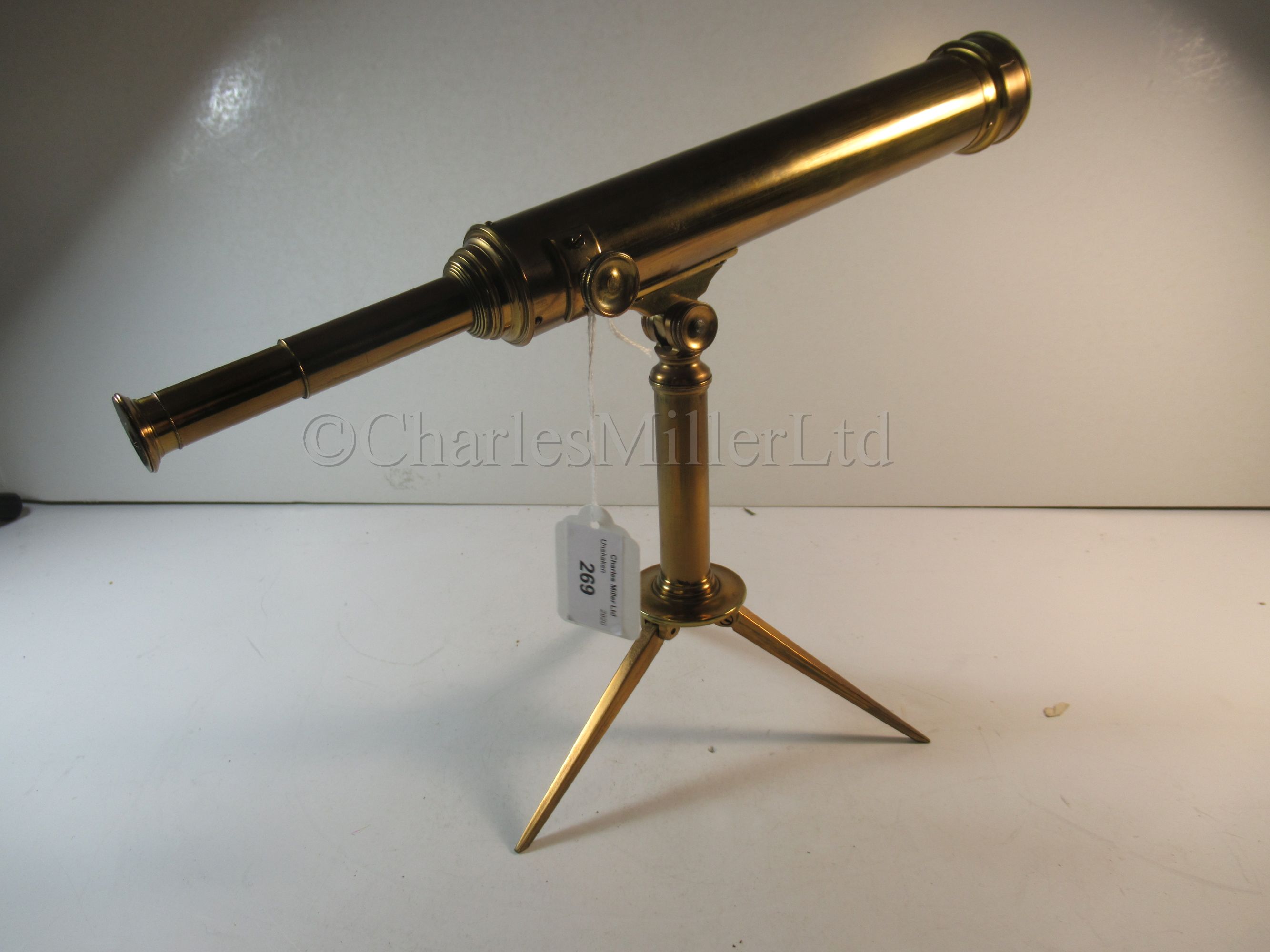 Lot 269 A SMALL 1¼IN. REFRACTING TABLE TELESCOPE BY