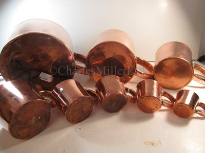 Lot 124 - A COMPLETE SET OF ROYAL NAVY COPPER RUM/GROG MEASURES, 20TH CENTURY