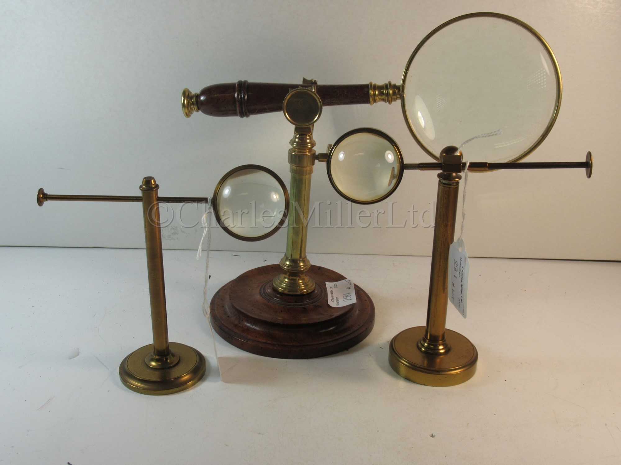 Lot 281 A CASED SET OF OPTICAL ACCESSORIES BY