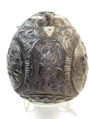 Lot 31 - A 19TH CENTURY FRENCH CARVED COCONUT BUGBEAR