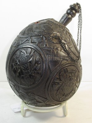 Lot 32 - A 19TH CENTURY CARVED COCONUT BUGBEAR