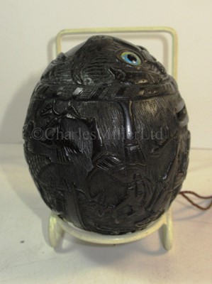 Lot 34 - AN UNUSUAL 19TH CENTURY CARVED COCONUT BUGBEAR