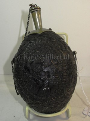 Lot 30 - A 19TH CENTURY CARVED COCONUT BUGBEAR