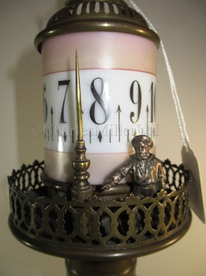 Lot 50 - A NOVELTY BRASS AND GLASS LIGHTHOUSE CLOCK, PROBABLY FRENCH, CIRCA 1880