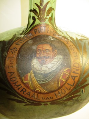 Lot 103 - A LARGE GREEN GLASS ONION BOTTLE COMMEMORATING ADMIRAL MAARTEN TROMP, CIRCA 1700