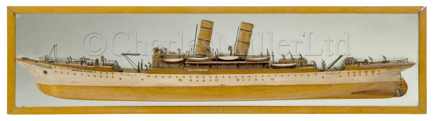 Lot 131 - A MIRROR-BACK HALF MODEL FOR THE S.S. EMPRESS OF JAPAN AS FITTED AS AN ARMED MERCHANT CRUISER, CIRCA 1914