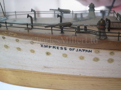 Lot 131 - A MIRROR-BACK HALF MODEL FOR THE S.S. EMPRESS OF JAPAN AS FITTED AS AN ARMED MERCHANT CRUISER, CIRCA 1914