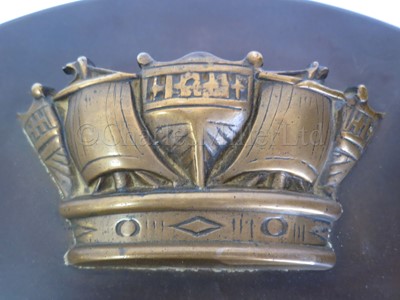 Lot 327 - AN UNUSUAL 5IN. TAMPION DISPLAY FROM H.M.S. HOOD