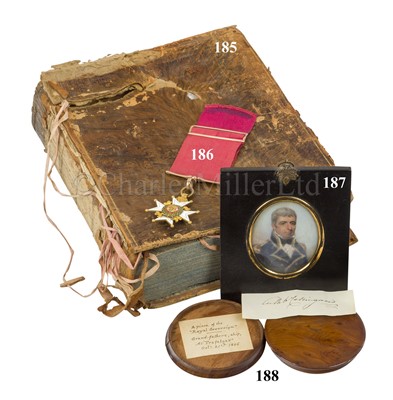 Lot 185 - CAPTAIN ROTHERAM'S SURVIVING COPY OF THE ENCYCLOPEDIA BRITANNICA DAMAGED IN HIS CABIN ABOARD COLLINGWOOD'S FLAGSHIP, H.M.S. ROYAL SOVEREIGN, AT THE BATTLE OF TRAFALGAR, 1805