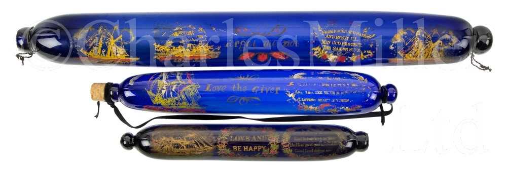 Lot 61 - AN OVERSIZED BRISTOL BLUE TRANSFER-PRINT ROLLING PIN OR NAILSEA SALT, CIRCA 1860 and two others