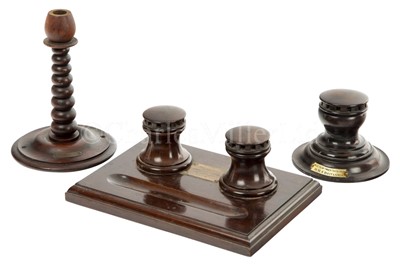 Lot 215 - A CAPSTAN INKWELL MADE FROM THE TREEN OF H.M.S. BRITANNIA and other Britannia items