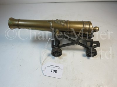 Lot 198 - A BRASS MODEL OF A NAVAL GUN, POSSIBLY 19TH CENTURY