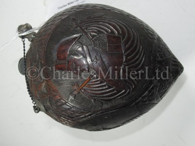 Lot 189 - A FINE ‘BUGBEAR’ COCONUT CARVED SHELL POSSIBLY COMMEMORATING THE LOUISIANA PURCHASE OF 1803