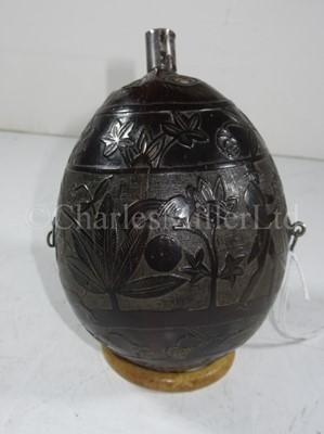 Lot 41 - A CARVED COCONUT BUGBEAR FLASK, CIRCA 1830