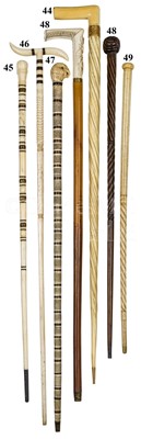 Lot 48 - A SAILORWORK MARINE IVORY AND WOOD MASONIC WALKING STICK, 19TH CENTURY and another
