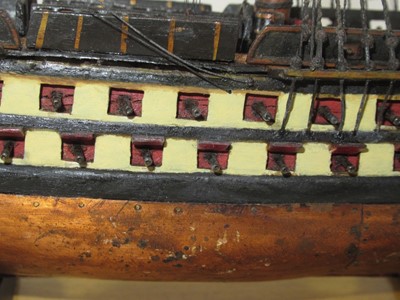 Lot 164 - A WELL RESTORED EARLY 19TH-CENTURY FRENCH NAPOLEONIC PRISONER-OF-WAR WOOD MODEL FOR A 74-GUN SHIP