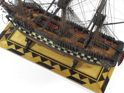Lot 164 - A WELL RESTORED EARLY 19TH-CENTURY FRENCH NAPOLEONIC PRISONER-OF-WAR WOOD MODEL FOR A 74-GUN SHIP