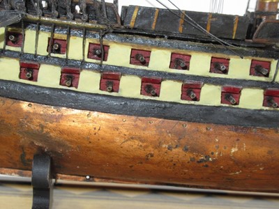 Lot 164 - A WELL RESTORED EARLY 19TH-CENTURY FRENCH NAPOLEONIC PRISONER-OF-WAR WOOD MODEL FOR A 74-GUN SHIP