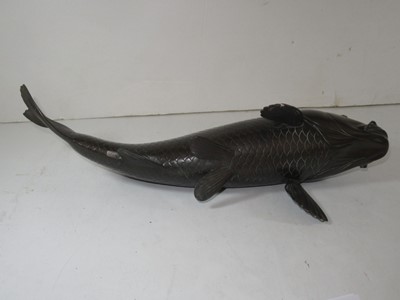 Lot 223 - A BRONZE MODEL OF A CARP BELIEVED TO HAVE BEEN PRESENTED TO THE ROYAL NAVAL CLUB BY OFFICERS OF THE I.J.N. ASAHI TO COMMEMORATE HER LAUNCH, CIRCA 1900