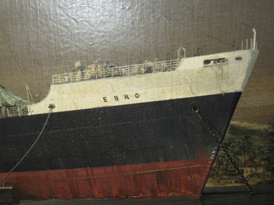 Lot 94 - δ ROBERT G. LLOYD (BRITISH, B. 1969) - THE ROYAL MAIL LINE PASSENGER CARGO SHIP 'EBRO' AT ANCHOR OFF THE PORT OF SPAIN CIRCA 1955