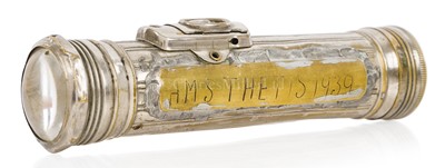 Lot 275 - A POCKET TORCH RECOVERED FROM H.M. SUBMARINE THETIS, 1939