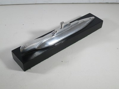 Lot 207 - A POLISHED ALUMINIUM PRESENTATION DESK MODEL OF A SUBMARINE, CIRCA 1930