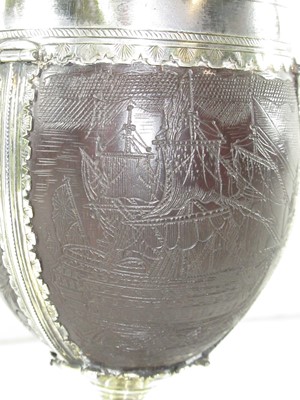 Lot 139 - AN EARLY 18TH CENTURY COCONUT CUP MOUNTED IN 17TH CENTURY 'PIRATE' SILVER