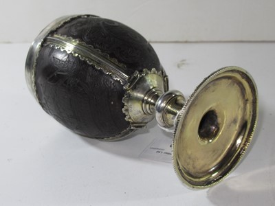 Lot 139 - AN EARLY 18TH CENTURY COCONUT CUP MOUNTED IN 17TH CENTURY 'PIRATE' SILVER