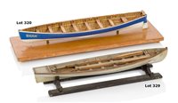 Lot 329 - A FINELY CARVED MODEL OF A ROYAL NAVY SHIP'S...