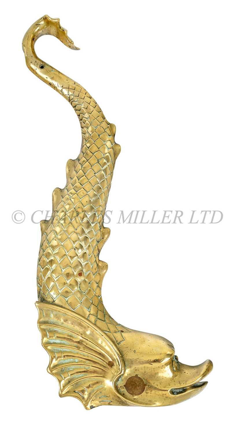 Lot 191 - A DECORATIVE BRASS DOLPHIN FROM THE ADMIRAL'S BARGE OF H.M.S. LONDON, CIRCA 1930