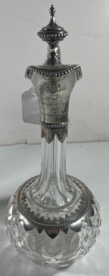 Lot 14 - A PAIR OF GERMAN SILVER-MOUNTED ROYAL PRESENTATION CUT GLASS CLARET JUGS, CIRCA 1869