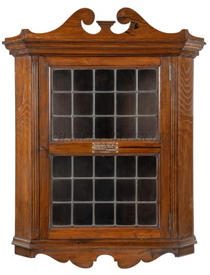 Lot 146 - A CORNER CUPBOARD MADE FROM 'FOUDROYANT' OAK, CIRCA 1898