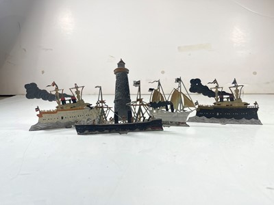 Lot 100 - COLLECTION OF GERMAN LEAD TOY LIGHTHOUSE AND BATTLESHIPS, CIRCA 1890